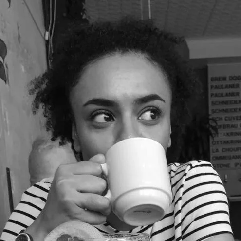 Sabine drinking coffee